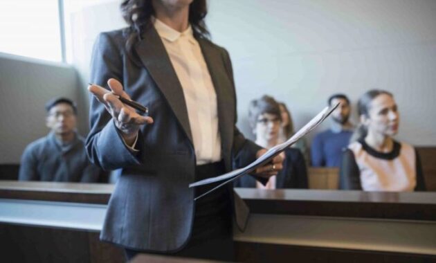 Lawyer injury victim rubberball pointing